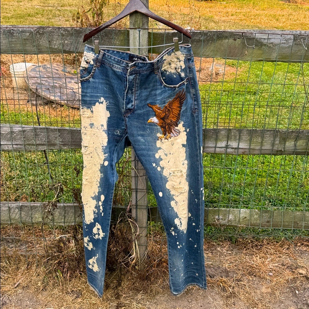 Akoo Blue bleached  Men’s relaxed Jeans with raised eagle design.